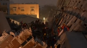 The search for survivors of the powerful 6.4 magnitude quake in Taiwan continued through the night.  Five are still reported to be missing.  (Photo grabbed from Reuters video)