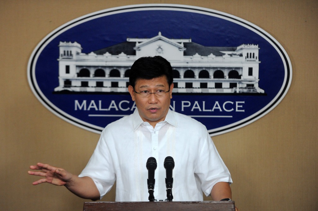 Philippine Environment Secretary Ramon Paje gestures while explaining the government's new policy governing the mining industry at the Malacnang Palace in Manila on July 9, 2012. The government said it would not approve new mining permits until Congress passed a bill increasing royalties on the industry as part of the new rules. AFP PHOTO / Jay DIRECTO / AFP / JAY DIRECTO