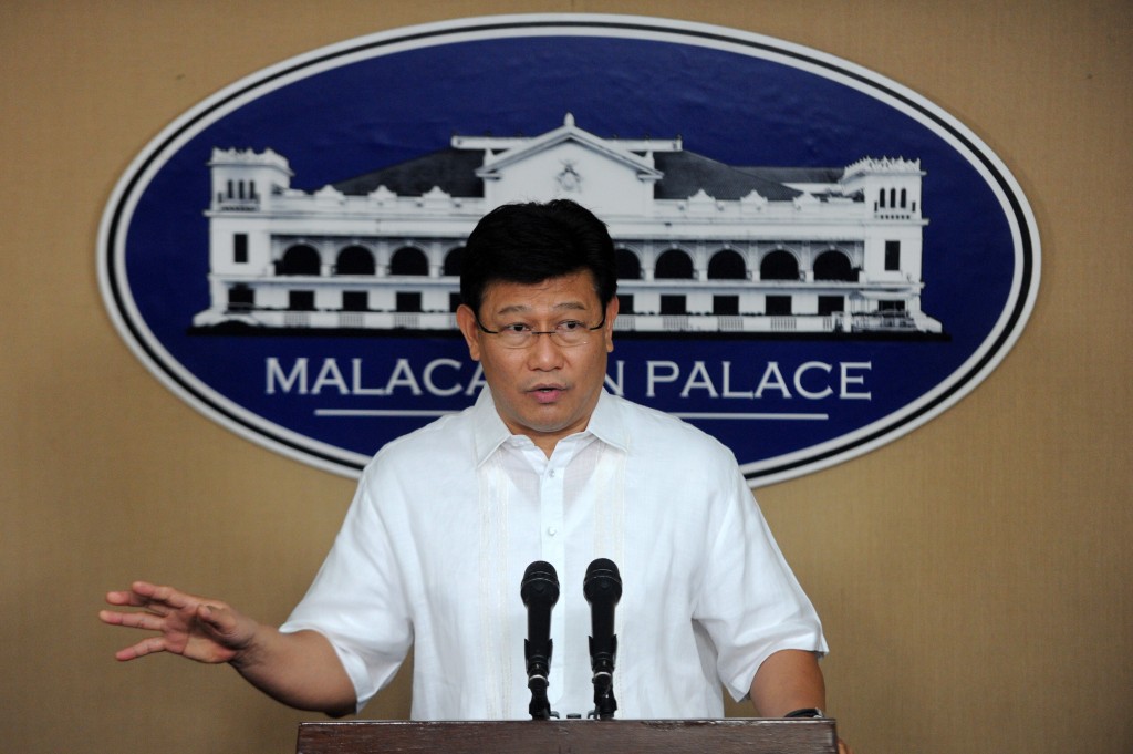 Philippine Environment Secretary Ramon Paje gestures while explaining the government's new policy governing the mining industry at the Malacnang Palace in Manila on July 9, 2012. The government said it would not approve new mining permits until Congress passed a bill increasing royalties on the industry as part of the new rules.   AFP PHOTO / Jay DIRECTO / AFP / JAY DIRECTO