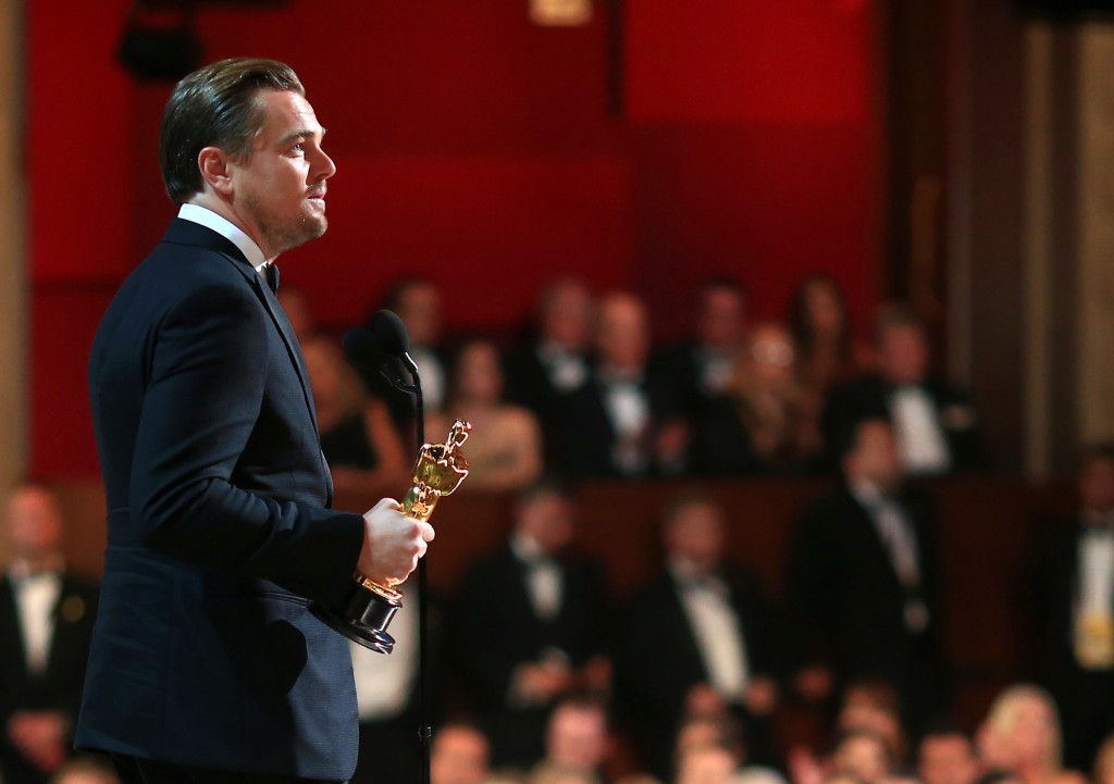 HOLLYWOOD, CA - FEBRUARY 28: Actor Leonardo DiCaprio accepts the Best Performance by an Actor in a Leading Role award for "The Revenant" onstage during the 88th Annual Academy Awards at Dolby Theatre on February 28, 2016 in Hollywood, California. Christopher Polk/Getty Images/AFP
