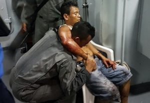 (File photo) This undated handout picture release on April 16, 2016 by the Malaysian Maritime Enforcement Agency shows a member of Malaysian Maritime Enforcement Force rescuing an Indonesian sailor after being shot during a kidnapping at the east coast of Malaysia's Sabah state in Lahad Datu.  Gunmen have abducted four Indonesian sailors and shot and wounded one crew member on the high seas off the east coast of Malaysia's Sabah state, waters where Abu Sayyaf militants are known to operate, a senior police official said April 16. / AFP PHOTO / Malaysian Maritime Enforcement A / 
