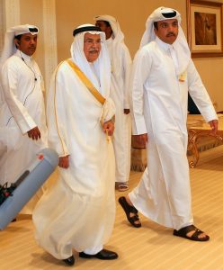 Saudi Arabia's minister of Oil and Mineral Resources Ali al-Naimi (C) arrives for the organization of Petroleum Exporting Countries (OPEC) meeting, in the Qatari capital Doha, on April 17, 2016. Top energy officials from some 15 countries including Saudi Arabia and Russia are at the Doha talks, amid reports a draft agreement was in the works to freeze output at January levels until at least October. / AFP PHOTO / KARIM JAAFAR