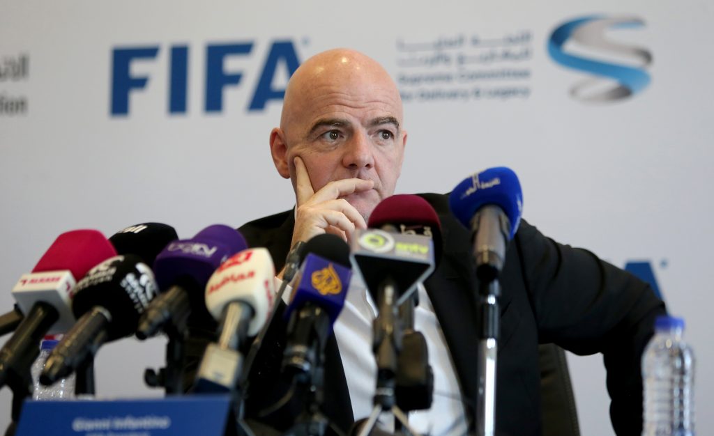 FIFA President Gianni Infantino attends a press conference in the Qatari capital Doha on April 22, 2016. Infantino announced that a new independent committee would be set up to monitor conditions for labourers working to build stadia for the 2022 World Cup in Qatar. Speaking during his first visit to Doha as head of world football's governing body, Infantino said he was "confident we are on the right track" after a string of alleged rights violations during the tournament's construction phase. He said the new committee "shows that the mechanisms in place are working related to FIFA World Cup". / AFP PHOTO / KARIM JAAFAR