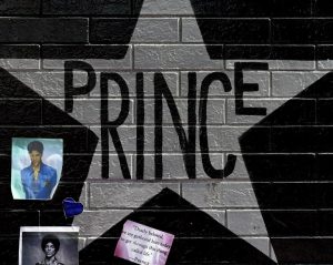 The star of music legend Prince,who died suddenly at the age of 57, is seen on April 23, 2016 at the First Avenue club where he started his music career in Minneapolis, Minnesota. Stunned fans massed outside the superstar's Paisley Park studio complex on the outskirts of Minneapolis are looking to an autopsy carried out earlier in the day to resolve the mystery around the sudden loss of their idol. / AFP PHOTO / Mark Ralston