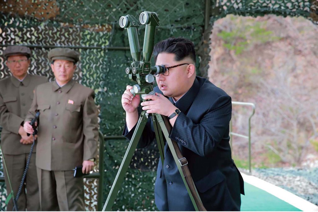 This picture released from North Korea's official Korean Central News Agency (KCNA) on April 24, 2016 shows North Korean leader Kim Jong-Un (R) inspecting an underwater test-fire of a strategic submarine ballistic missile at an undisclosed location in North Korea on April 23, 2016. North Korean leader Kim Jong-Un hailed a submarine-launched ballistic missile (SLBM) test as an "eye-opening success", state media said on April 24, declaring Pyongyang has the ability to strike Seoul and the US whenever it pleases.  / AFP PHOTO / KCNA VIA KNS / KCNA /  - South Korea OUT / REPUBLIC OF KOREA OUT   ---EDITORS NOTE--- RESTRICTED TO EDITORIAL USE - MANDATORY CREDIT "AFP PHOTO/KCNA VIA KNS" - NO MARKETING NO ADVERTISING CAMPAIGNS - DISTRIBUTED AS A SERVICE TO CLIENTS THIS PICTURE WAS MADE AVAILABLE BY A THIRD PARTY. AFP CAN NOT INDEPENDENTLY VERIFY THE AUTHENTICITY, LOCATION, DATE AND CONTENT OF THIS IMAGE. THIS PHOTO IS DISTRIBUTED EXACTLY AS RECEIVED BY AFP.  /