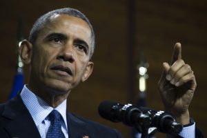 US President Barack Obama delivers remarks after touring the Hannover Messe Trade Fair in Hanover, Germany, April 25, 2016.   USA is partner country of the industrial fair Hannover Messe 2016 running from April 25 to April 29, 2016.  / AFP PHOTO / Jim Watson