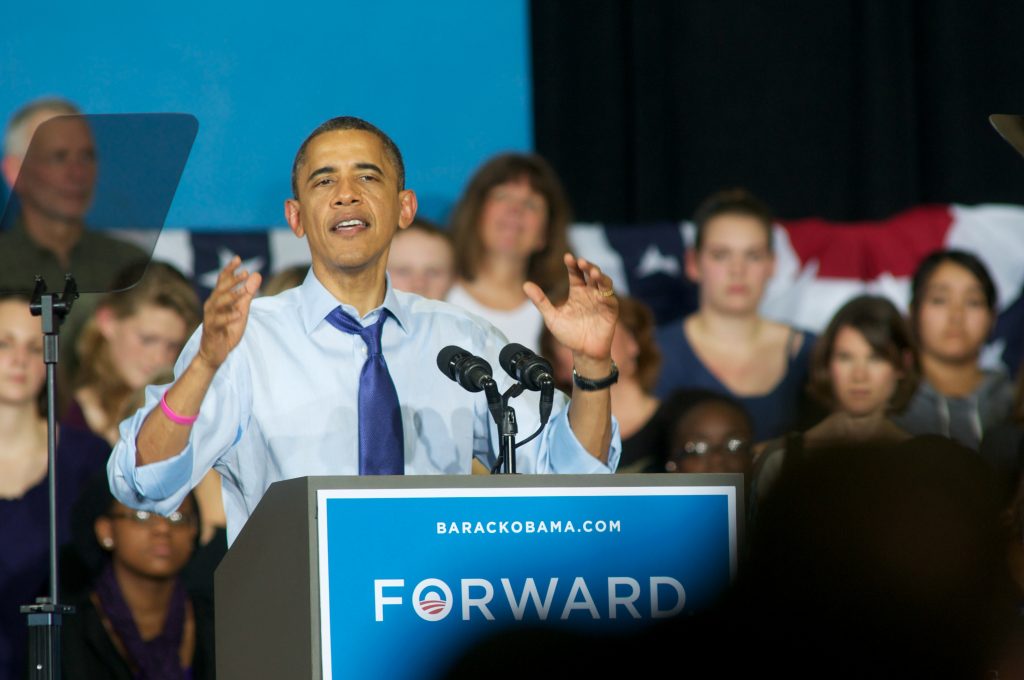 MOUNT VERNON, IA - OCTOBER 17: U.S. President Barrack Obama addresses a group at the Richard and Norma Small Multi-Sports Center Gym at Cornell College on October 17, 2012 in Mount Vernon, Iowa. President Obama visited the college campus in Iowa, a state that is still very much up for grabs, one day after the second Presidential Debate in order to highlight his plans for moving the country forward.   David Greedy/Getty Images/AFP