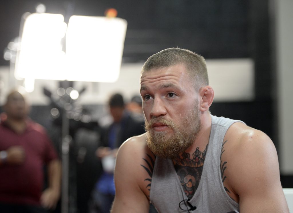 TORRENCE, CA - FEBRUARY 24: UFC featherweight champion Conor McGregor speaks during an interview after a news conference with lightweight contender Nate Diaz at UFC Gym February 24, 2016, in Torrance, California. Kevork Djansezian/Getty Images/AFP