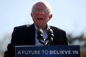 NEW YORK, NY - APRIL 17: Democratic Presidential candidate Bernie Sanders speaks to throngs of supporters in Prospect Park to hear Democratic Presidential candidate Bernie Sanders speak on April 17, 2016 In the Brooklyn borough of New York City. While Sanders is still behind in the delegate count with Hillary Clinton, he has energized many young and liberal voters around the country. New York holds its primary this Tuesday. Spencer Platt/Getty Images/AFP