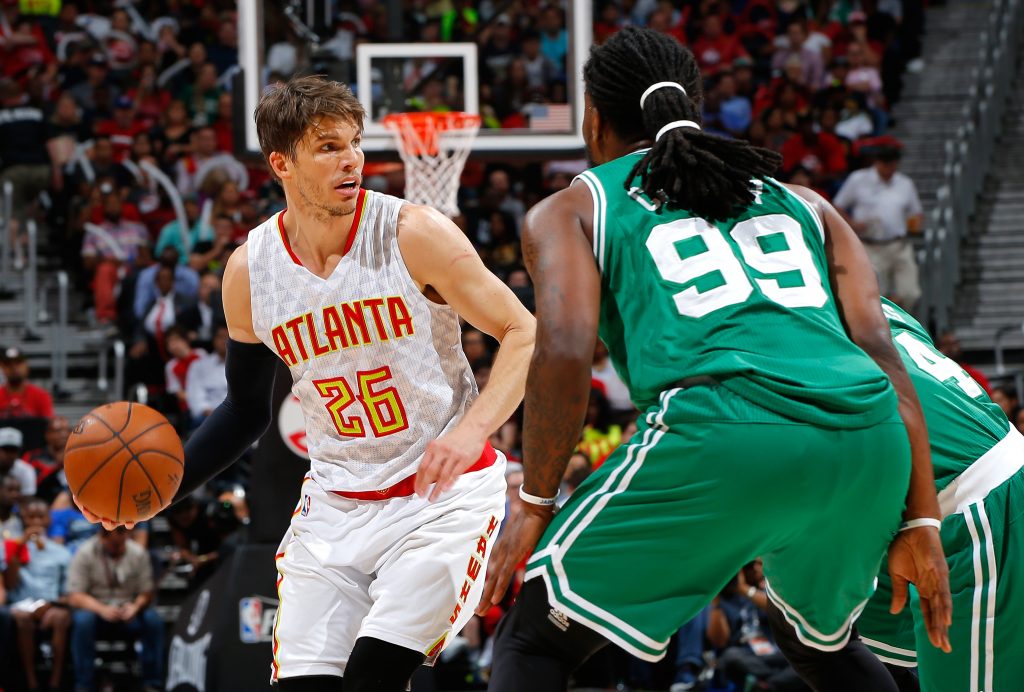 ATLANTA, GA - APRIL 26: Kyle Korver #26 of the Atlanta Hawks looks to pass against Jae Crowder #99 and Isaiah Thomas #4 of the Boston Celtics in Game Five of the Eastern Conference Quarterfinals during the 2016 NBA Playoffs at Philips Arena on April 26, 2016 in Atlanta, Georgia. NOTE TO USER User expressly acknowledges and agrees that, by downloading and or using this photograph, user is consenting to the terms and conditions of the Getty Images License Agreement.   Kevin C. Cox/Getty Images/AFP