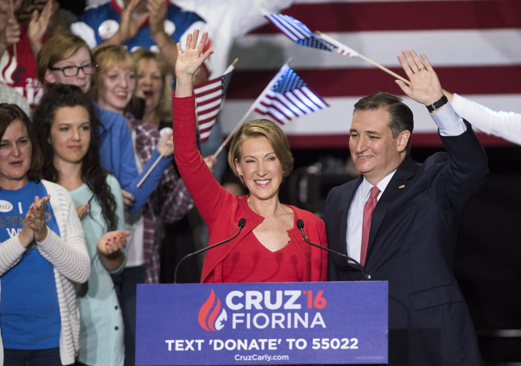 INDIANAPOLIS, IN - APRIL 27: Republican presidential candidate Sen. Ted Cruz (R-TX) (R) greets supporters with former Hewlett-Packard chief executive Carly Fiorina at a campaign rally in the Pavilion at the Pan Am Plaza on April 27, 2016 in Indianapolis, Indiana. Cruz named Carly Fiorina as his pick for Vice President running mate during the rally. Ty Wright/Getty Images/AFP