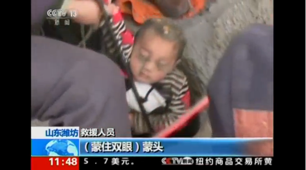 Firefighters rescue three-year-old boy from deep well in eastern China, state media reports.(photo grabbed from Reuters video) 