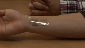 South Korean scientists have developed a smart patch that can monitor a diabetic's blood sugar levels through their sweat and deliver drugs when needed.(photo grabbed from Reuters video) 