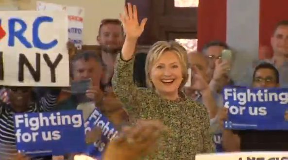 Campaigning in New York, Hillary Clinton tells supports in Staten Island that America is better than anywhere else and is already great.(photo grabbed from Reuters video) 
