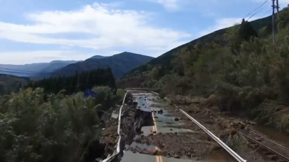 Drone footage shows deep cracks around seismic fault lines as well as the impact of a large landslide after powerful earthquakes in Japan.(photo grabbed from Reuters video)