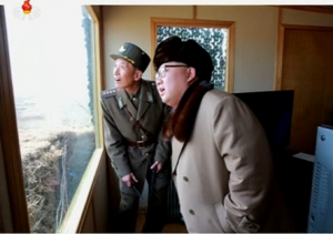 North Korean state television broadcasts still photographs of its leader Kim Jong Un watching a test of what Pyongyang says is a new type of anti-air guided weapon system. (Courtesy KRT/Reuters)