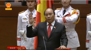 Nguyen Xuan Phuc is sworn in as Vietnam's new prime minister. He is taking on the challenge of maintaining the momentum of one of Asia's fastest-growing economies. (Screenshot from Reuters video) 