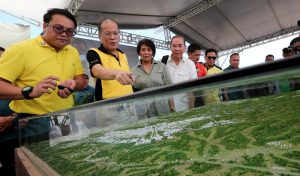 President Benigno S. Aquino III views the Clark Green City scale model during the groundbreaking ceremony of the project in Sitio Baloy, Barangay Aranguren, Capaz, Tarlac on Monday (April 11). In photo are Public Works and Highways Secretary Rogelio Singson, Interior and Local Government Secretary Mel Senen Sarmiento, Bases Conversion and Development Authority (BCDA) president and chief executive officer Arnel Paciano Casanova, BCDA chairperson Ma. Aurora Geotina-Garcia and Capas, Tarlac Mayor Antonio Rodriguez, Jr. (Photo by Joseph Vidal / Malacañang Photo Bureau) 