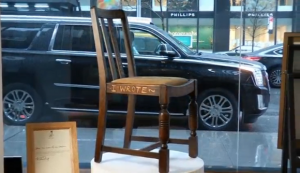 A chair used and signed by Harry Potter author J.K. Rowling is set to hit the auction block. (Photo grabbed from Reuters video/Courtesy Reuters)
