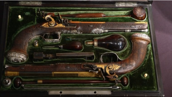 A pair of french silver-mounted pistols given to Simón Bolívar by revolutionary aristocrat Marquis de Lafayette during the Enlightenment period go up on the auction bloc at Christie's.(photo grabbed from Reuters video) 