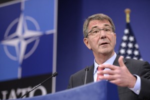 US Secretary of Defence Ashton Carter gestures as he addresses the media during the North Atlantic Council (NAC) of Defence Ministers' meeting at the NATO headquarter in Brussels on February 11, 2016. / AFP PHOTO / THIERRY CHARLIER