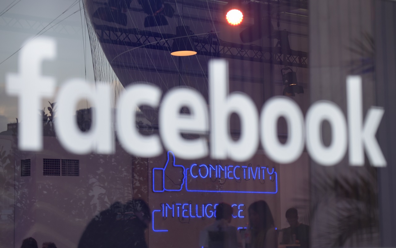 The "Facebook"-logo is pictured on the sidelines of a press preview of the so-called "Facebook Innovation Hub" in Berlin on February 24, 2016. / AFP PHOTO / TOBIAS SCHWARZ
