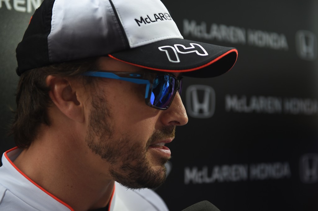 McLaren Honda's Spanish driver Fernando Alonso speaks during a briefing after his medical check ahead of the Formula One Chinese Grand Prix in Shanghai on April 14, 2016. / AFP PHOTO / GREG BAKER