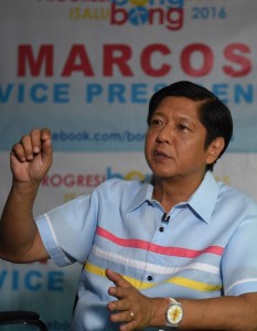 This photo taken on April 18, 2016 shows Ferdinand Marcos Jnr., son and namesake of the late Philippine dictator Ferdinand Marcos and a vice-presidential candidate for the May 9 elections, speaking during an interview with AFP at his campaign headquarters in Manila. / AFP PHOTO / TED ALJIBE 