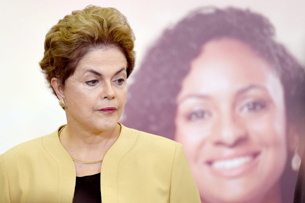Brazilian President Dilma Rousseff delivers a speech during a ceremony to announce the extension of the stay of Brazilian doctors trained abroad and foreigners participating in the More Medical Program, at Planalto Palace in Brasilia, on April 29, 2016. The Brazilian Senata formed a committee that will consider whether to impeach President Dilma Rousseff, who has accused her opponents of mounting a constitutional coup. / AFP PHOTO / EVARISTO SA