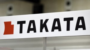 (FILES) This file photo taken on November 22, 2014 shows Japanese auto parts maker Takata's logo being displayed at an event in Yokohama, suburban Tokyo.  US auto safety regulators on May 4, 2016 ordered Japanese manufacturer Takata to recall between 35 and 40 million airbags installed in US cars, to push for the replacement of dangerously explosive inflators. The decision comes after the National Highway Traffic Safety Administration concluded that the inflators are prone to ruptures that have been tied to 11 deaths worldwide, and adds to nearly 29 million Takata airbags already recalled.  / AFP PHOTO / TORU YAMANAKA