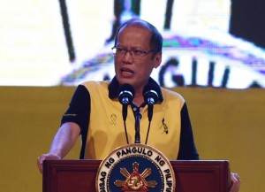 Philippine President Benigno Aquino speaks during the presidential campaign rally of a political ally Mar Roxas (not pictured) in Manila on May 7, 2016, ahead of the elections on May 9.  President Aquino warned May 7, the frontrunner in the race to replace him carried similar dangers to Hitler and would bring terror to the nation. / AFP PHOTO / TED ALJIBE