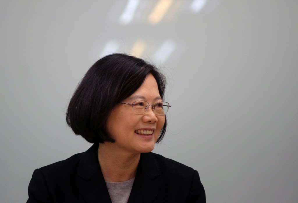 This picture taken on April 22, 2016 shows Taiwan's President-elect Tsai Ing-wen smiling during a press conference in Taipei. When Tsai Ing-wen takes office as Taiwan's president on May 20 she steps onto a tightrope between voter dreams of national pride and a Beijing that wants the island on a short leash. / AFP PHOTO / SAM YEH