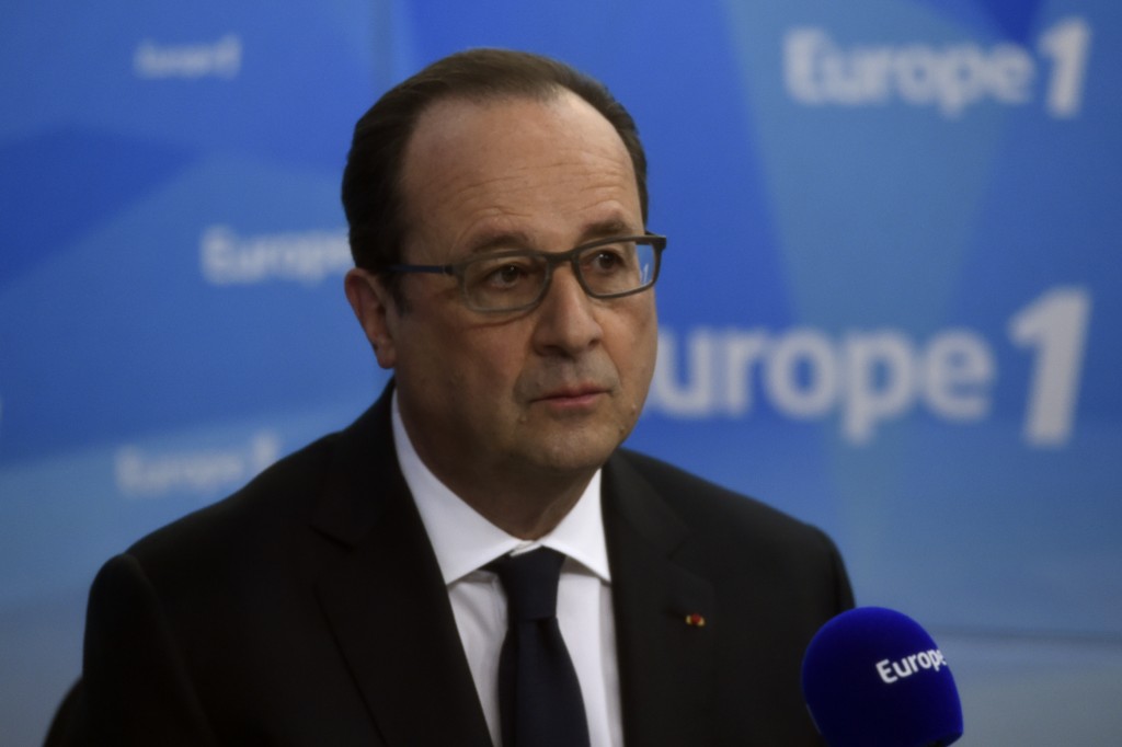 France's President Francois Hollande speaks during a morning radio show on France's Europe 1 station on May 17, 2016 in Paris.  French President Francois Hollande on May 17 ruled out withdrawing the labour market reforms which have sparked street protests for weeks and led to a vote of no-confidence in the government. / AFP PHOTO / POOL / MIGUEL MEDINA / AFP PHOTO / POOL / MIGUEL MEDINA