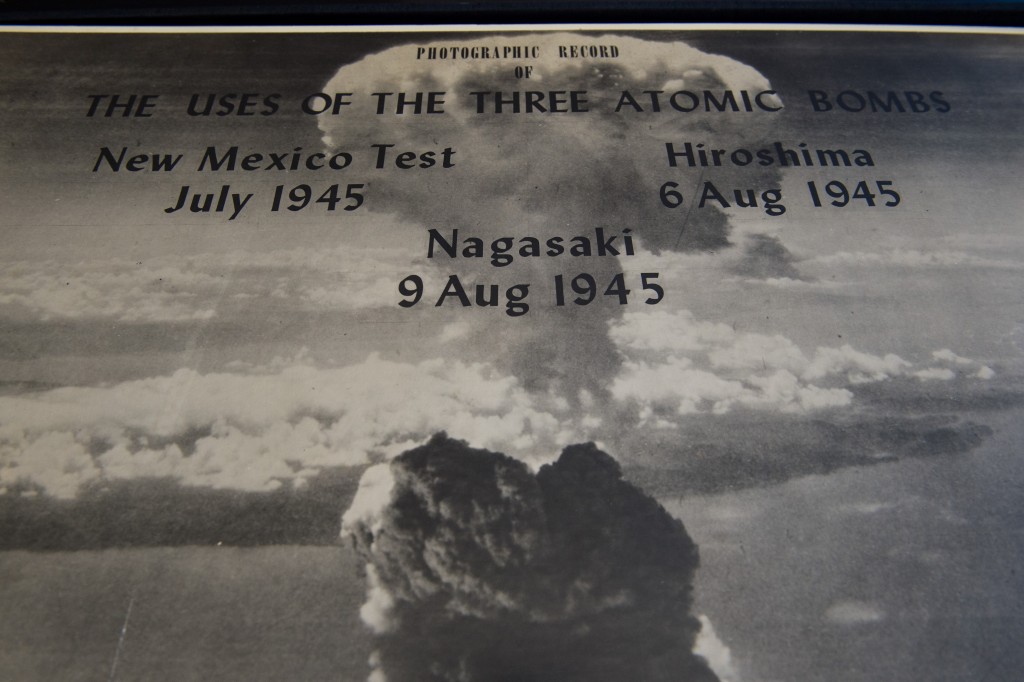 A picture taken by the US military shows the title photo of a mushroom cloud from one of the two atomic bombs dropped on Japan in August 1945, which was shown at the time during a briefing to a group of top government officials at the Department of War, at the Stimson Center in Washington, DC, on May 16, 2016.  The institution has had the photographs since the 1990s, but Krepon last year decided to gift them to the Hiroshima Peace Memorial Museum. After some negotiation about where and how the photos would be displayed, they will be sent to Japan in the coming weeks.   / AFP PHOTO / Nicholas Kamm