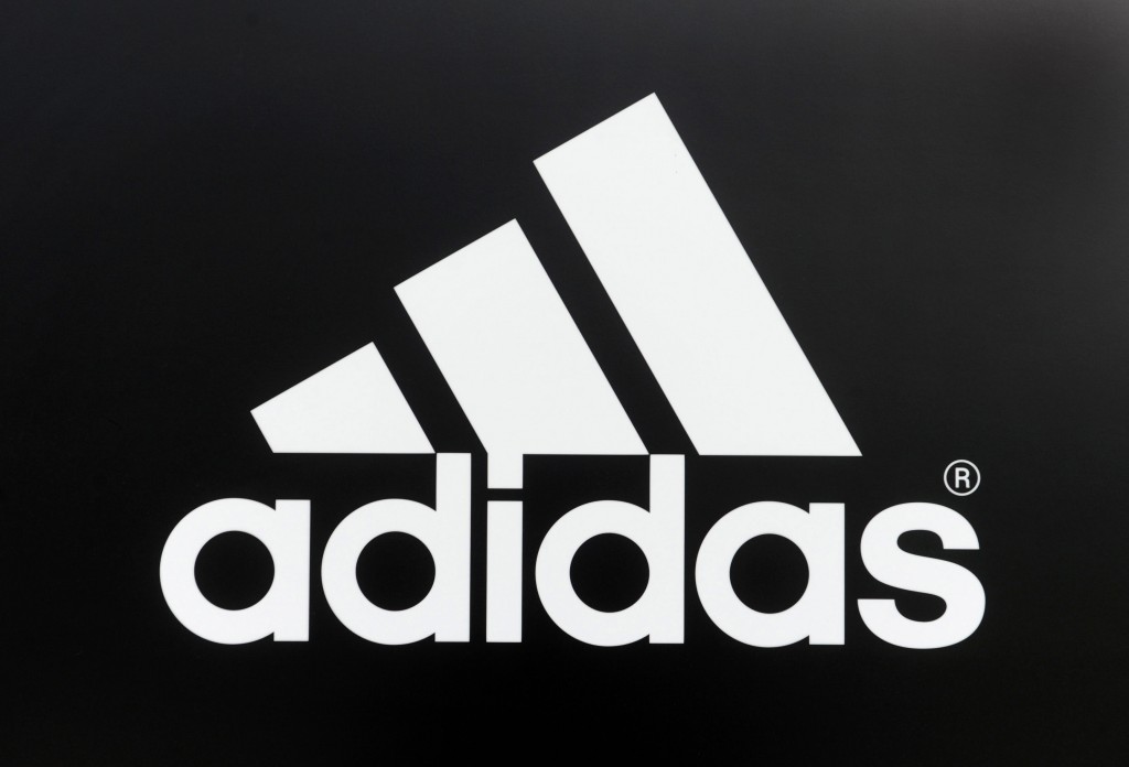 The logo of German sportswear and equipment group Adidas can be seen at the company's headquarters in Herzogenaurach, southern Germany, June 21, 2010. Adidas said that it expected football-related sales to reach at least 1.5 billion euros (1.9 billion dollars) this year thanks to the World Cup in South Africa. Adidas sponsors 12 of the World Cup teams, including heavyweights Germany, Argentina, Spain and France as well as hosts South Africa. AFP PHOTO / CHRISTOF STACHE / AFP PHOTO / CHRISTOF STACHE
