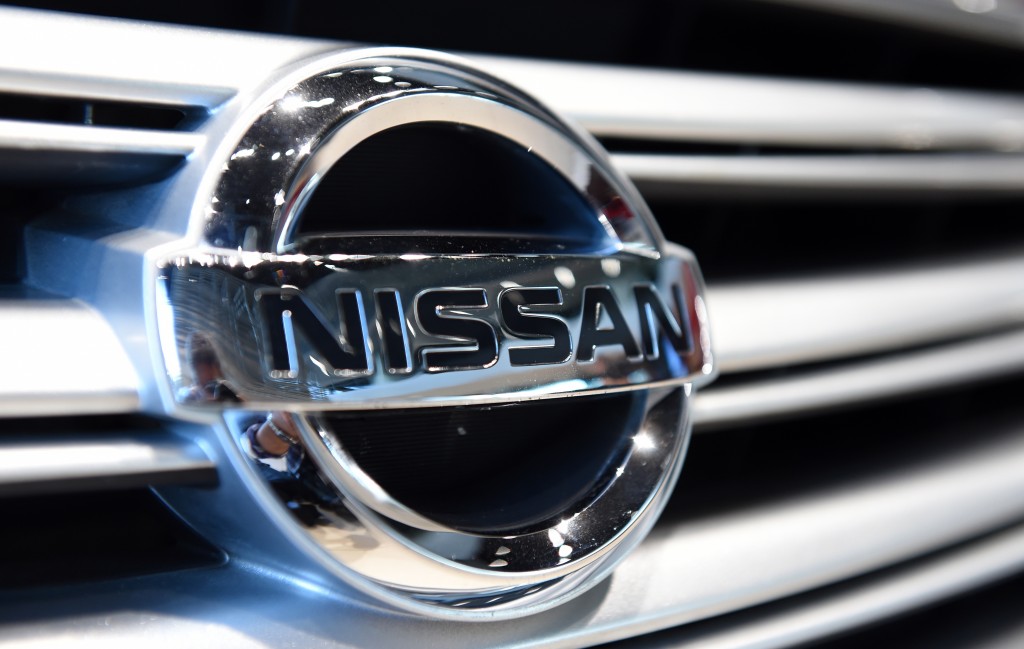 A general view shows a logo of Nissan Motors on a vehicle displayed at the company's showroom in Yokohama on May 13, 2015. Nissan on May 13 said its fiscal-year net profit soared 17.6 percent to 4.2 billion USD, crediting a weak yen and new model rollouts for buoyant results that drove past its own earlier forecasts.  AFP PHOTO / TOSHIFUMI KITAMURA / AFP PHOTO / TOSHIFUMI KITAMURA