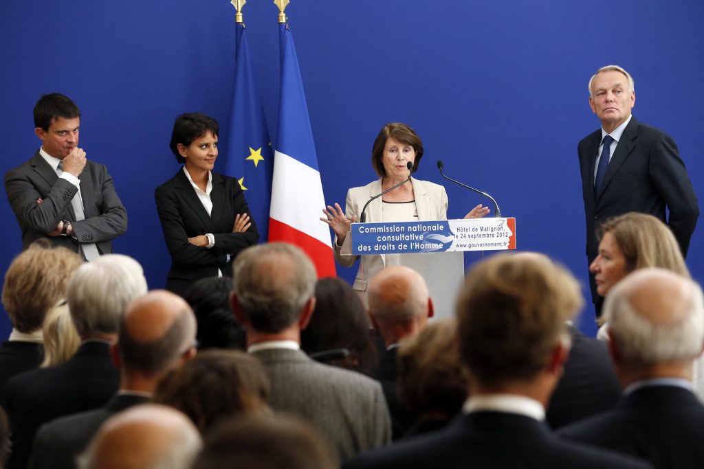 The newly-appointed President of the National Consultative Commission of Human Rights (CNCDH), Christine Lazerges (C) speaks near French Prime Minister, Jean-Marc Ayrault (R) during the CNCDH installation, on September 24, 2012 at the Hotel Matignon in Paris. (L) French Interior Minister, Manuel Valls; (2ndL) Minister for Women's Rights and Government Spokeperson, Najat Vallaud-Belkacem. AFP PHOTO / PIERRE VERDY / AFP PHOTO / PIERRE VERDY