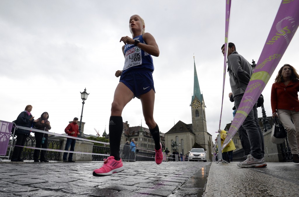 One of the Estonian triplets sisters Luik , Lily Luik competes during the women's Marathon at the European Athletics Championships in Zurich on August 16, 2014. AFP PHOTO /FRANCK FIFE / AFP PHOTO / FRANCK FIFE