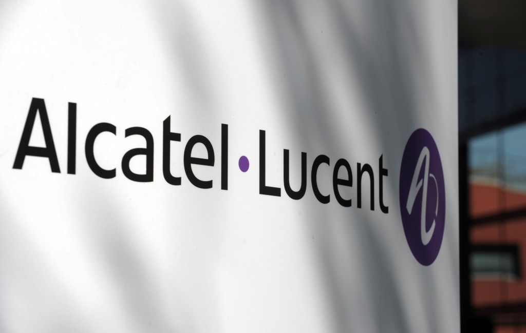 A picture taken in front of one site of Franco-US Telecommunications equipment group Alcatel-Lucent shows the company's logo in Boulogne-Billancourt near Paris on April 14, 2015.  Finnish telecoms equipment maker Nokia said Tuesday it was in talks to purchase all of its Franco-American rival Alcatel-Lucent, with the aim of creating a telecoms and Internet technology behemoth.  AFP PHOTO  ERIC PIERMONT / AFP PHOTO / ERIC PIERMONT