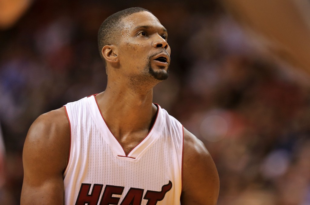 MIAMI, FL - JANUARY 04: Chris Bosh #1 of the Miami Heat shoots a foul shot during a game against the Indiana Pacers at American Airlines Arena on January 4, 2016 in Miami, Florida. NOTE TO USER: User expressly acknowledges and agrees that, by downloading and/or using this photograph, user is consenting to the terms and conditions of the Getty Images License Agreement. Mandatory copyright notice:   Mike Ehrmann/Getty Images/AFP