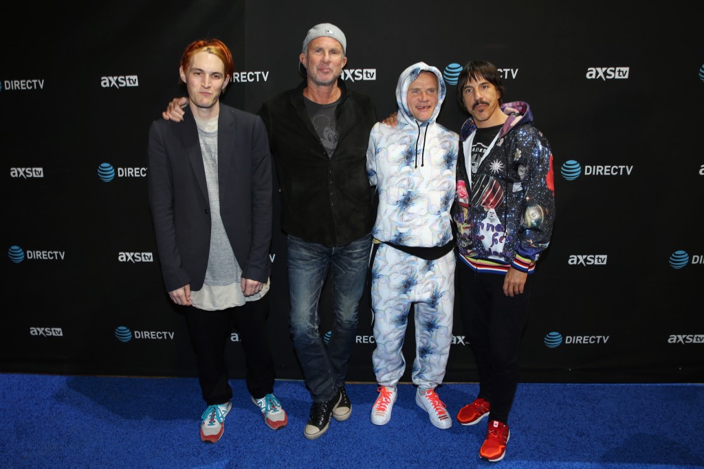 SAN FRANCISCO, CA - FEBRUARY 06: (L-R) Musicians Josh Klinghoffer, Chad Smith, Flea and Anthony Kiedis of The Red Hot Chili Peppers attend DirecTV Super Saturday Night Co-hosted by Mark Cuban's AXS TV at Pier 70 on February 6, 2016 in San Francisco, California.   Joe Scarnici/Getty Images for DirecTV/AFP