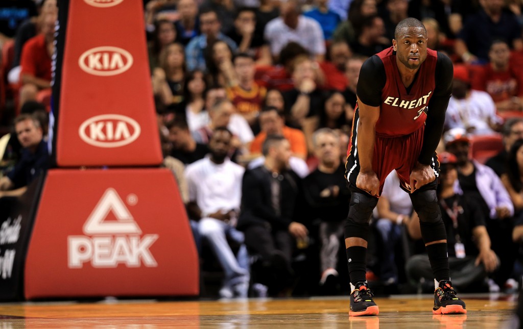 MIAMI, FL - MARCH 19: Dwayne Wade #3 of the Miami Heat looks on during a game against the Cleveland Cavaliers at American Airlines Arena on March 19, 2016 in Miami, Florida. NOTE TO USER: User expressly acknowledges and agrees that, by downloading and or using this photograph, User is consenting to the terms and conditions of the Getty Images License Agreement. Mike Ehrmann/Getty Images/AFP