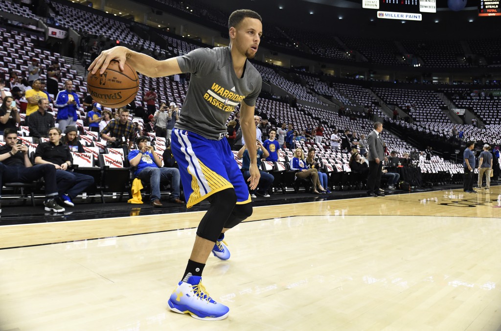PORTLAND, OR - MAY 9: Stephen Curry #30 of the Golden State Warriors warms up before Game Four of the Western Conference Semifinals during the 2016 NBA Playoffs against the Portland Trail Blazers at the Moda Center on May 9, 2016 in Portland, Oregon. NOTE TO USER: User expressly acknowledges and agrees that by downloading and/or using this photograph, user is consenting to the terms and conditions of the Getty Images License Agreement.   Steve Dykes/Getty Images/AFP