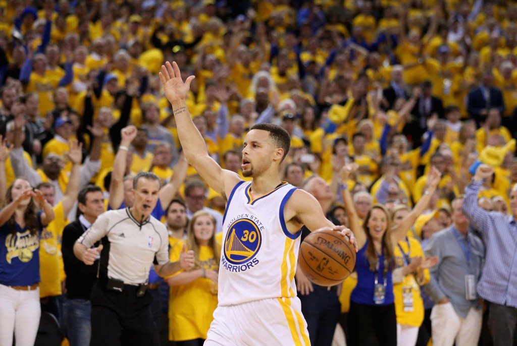 OAKLAND, CA - MAY 11: Stephen Curry #30 of the Golden State Warriors runs down court during the finals seconds of their win over the Portland Trail Blazers in Game Five of the Western Conference Semifinals during the 2016 NBA Playoffs on May 11, 2016 at Oracle Arena in Oakland, California. NOTE TO USER: User expressly acknowledges and agrees that, by downloading and or using this photograph, User is consenting to the terms and conditions of the Getty Images License Agreement.   Ezra Shaw/Getty Images/AFP