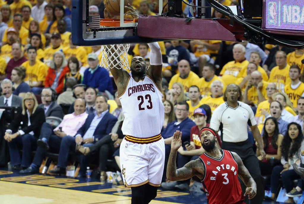 CLEVELAND, OH - MAY 19: LeBron James #23 of the Cleveland Cavaliers dunks the ball during the first half against the Toronto Raptors in game two of the Eastern Conference Finals during the 2016 NBA Playoffs at Quicken Loans Arena on May 19, 2016 in Cleveland, Ohio.   Andy Lyons/Getty Images/AFP