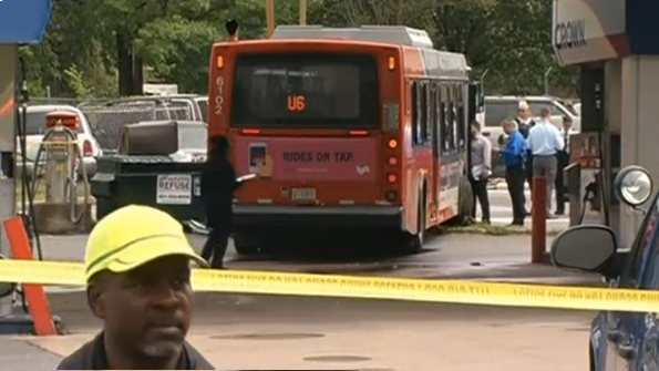 A man hijacked a Washington D.C. bus and drove it into a gas station, killing a pedestrian, police say.(photo grabbed from Reuters video)