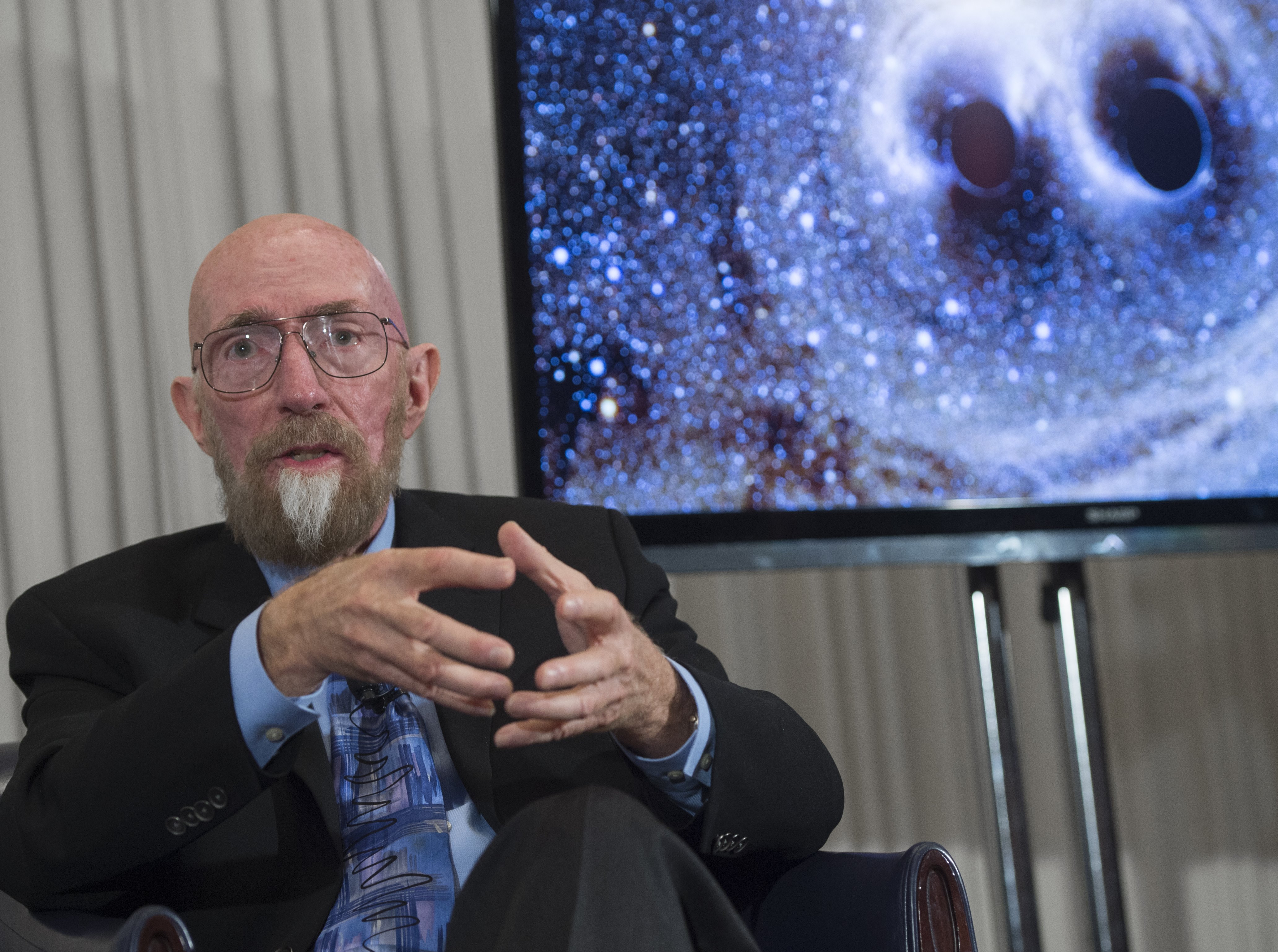 LIGO co-founders Kip Thorne speaks about the discovery that scientists have observed the ripples in the fabric of spacetime called gravitational waves for the first time, confirming a prediction of Albert Einstein's theory of relativity, during a press conference at the National Press Club in Washington, DC, February 11, 2016. The machines that gave scientists their first-ever glimpse at gravitational waves are the most advanced detectors ever built for sensing tiny vibrations in the universe.The two US-based underground detectors are known as the Laser Interferometer Gravitational-wave Observatory, or LIGO for short. / AFP PHOTO / SAUL LOEB