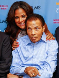 (FILES) This file photo taken on October 01, 2013 shows Laila Ali and Muhammad Ali at the U.S. Premiere of "Muhammad Ali's Greatest Fight" at Muhammad Ali Center in Louisville, Kentucky. Boxing legend Muhammad Ali, dies at 74. The former heavyweight world champion was hospitalized on Thursday at a Phoenix, Arizona, hospital with a respiratory issue, which US media reported was complicated by his Parkinson's disease. / AFP PHOTO / GETTY IMAGES NORTH AMERICA / Michael Hickey