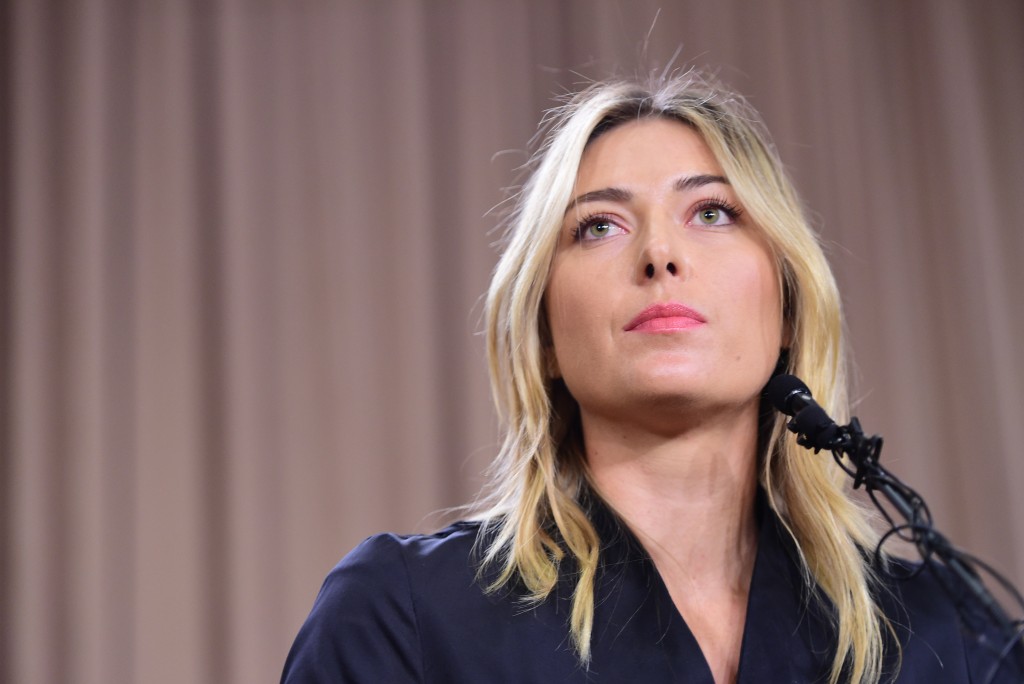 (FILES) This file photo taken on March 07, 2016 shows Russian tennis player Maria Sharapova speaking during a press conference in Los Angeles. Russian tennis star Maria Sharapova has been banned for two years after failing a drug test, the International Tennis Federation (ITF) announced on June 8, 2016. Sharapova tested positive for the controversial banned medication meldonium during January's Australian Open. / AFP PHOTO / Robyn BECK