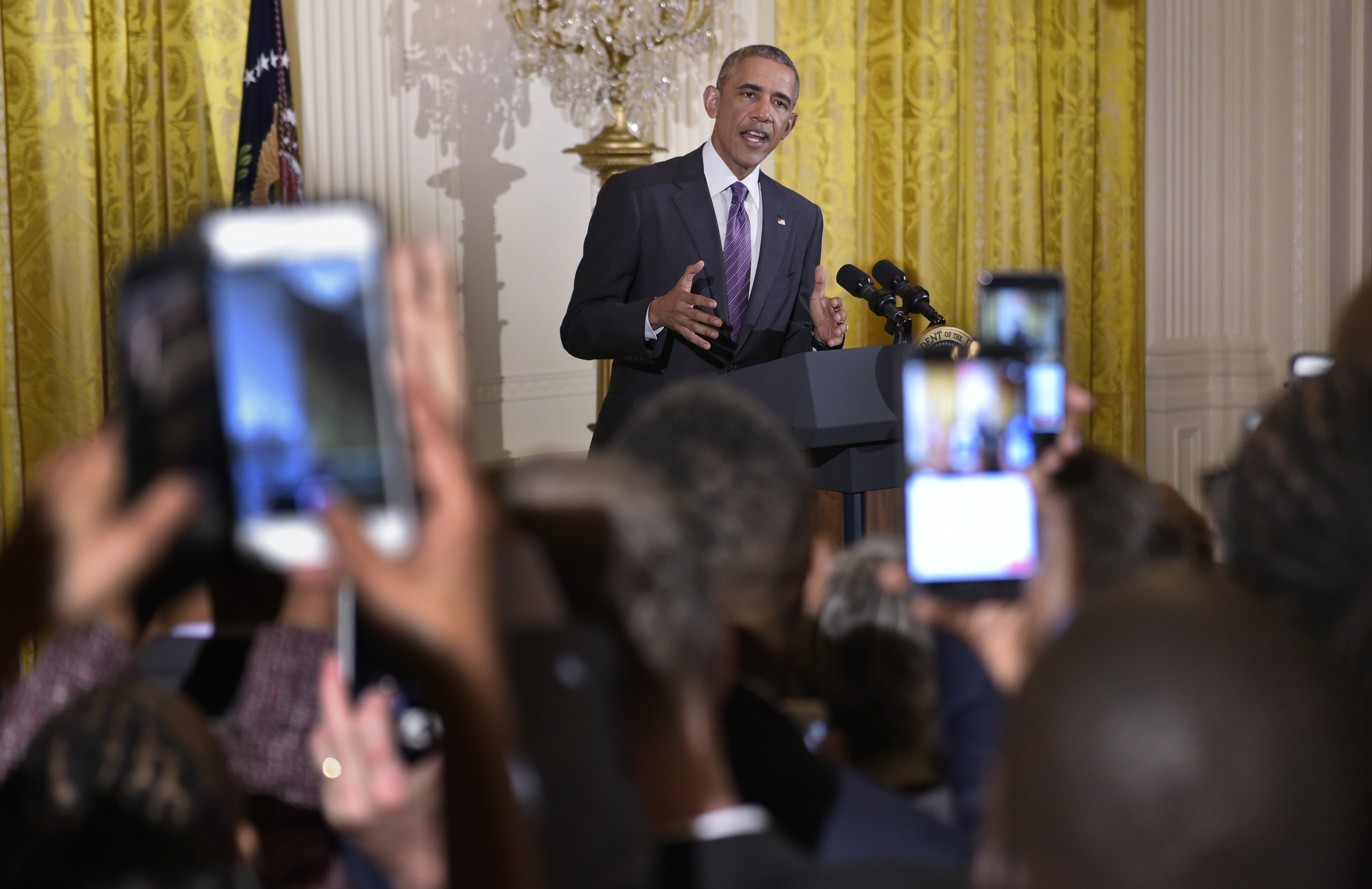 US President Barack Obama speaks during a reception to mark LGBT month in the East Room of the White House on June 9, 2016 in Washington, DC. / AFP PHOTO / Mandel Ngan